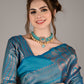 Teal Silk Blend Woven Saree With Unstitched Blouse