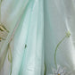 Odett Sea Green Printed Chiffon Saree with Unstitched Blouse for Women