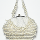 Rajwada White Suede Stone And Pearl Embellished Potli For Women