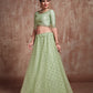 Rajwada Women Green Sequins Sassy Semi Stitched Lehenga With Unstitched Blouse