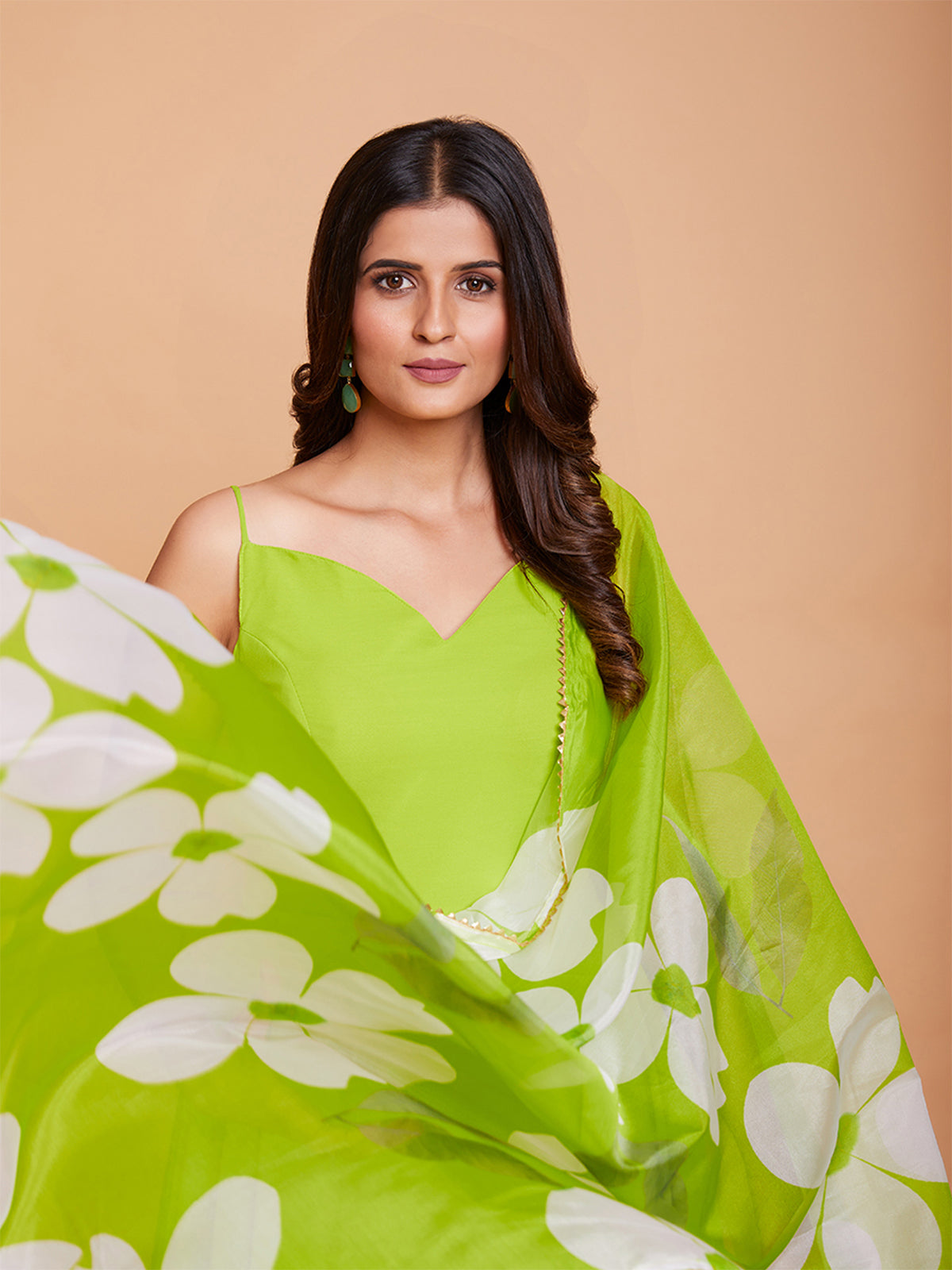 Green Faux Georgette Solid Stitched Gown