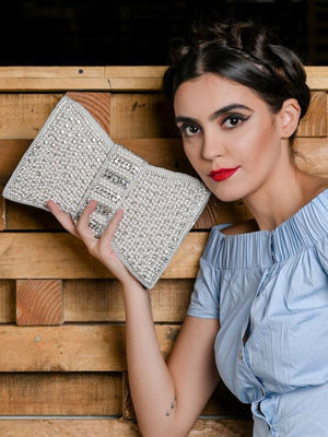 Rajwada White Pearl Beaded And Silver Rhinestone Clutch.