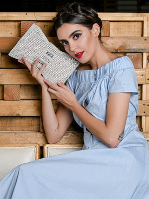 Rajwada White Pearl Beaded And Silver Rhinestone Clutch.