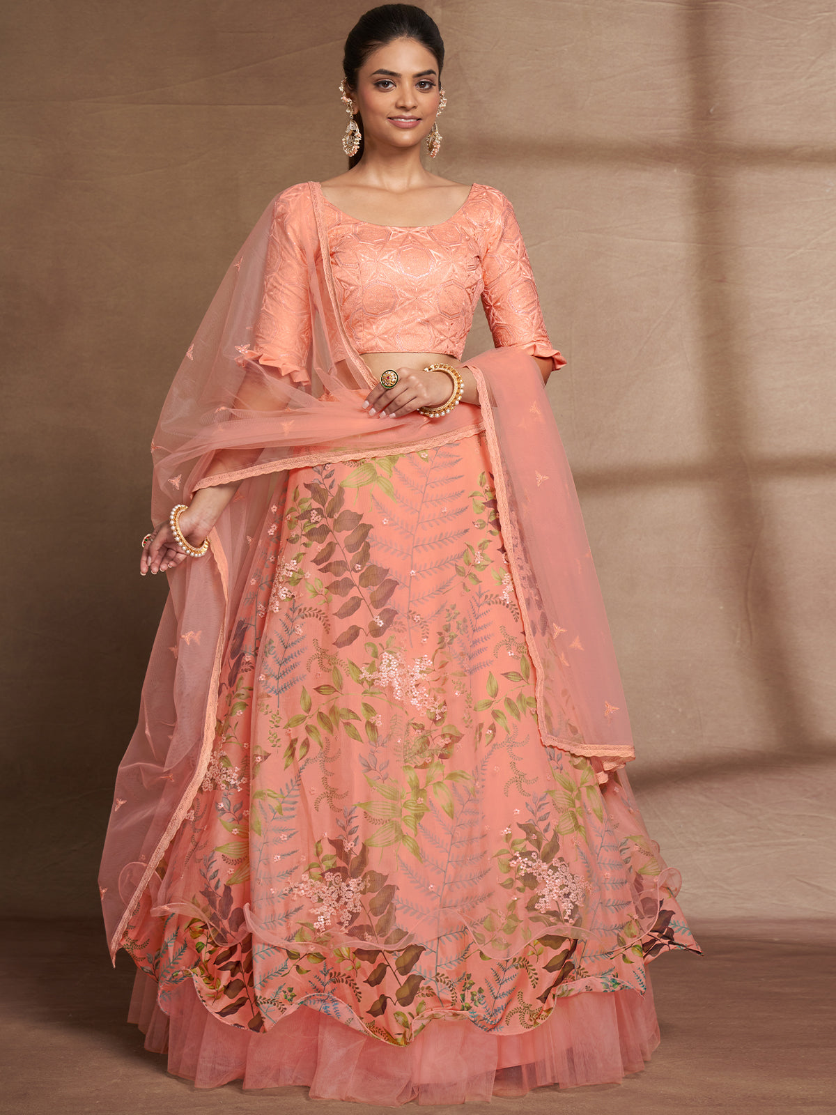 Peach Net Print With Sequins Semi Stitched Lehenga Choli