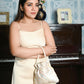Rajwada Cream Silk Embroidered Golden And Pastel Threads Potli For Women