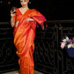Rajwada Women Festive Orange Silk Blend Woven Saree With Unstitched Blouse