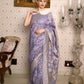 Rajwada Women Festive Purple Silk Blend Woven Saree With Unstitched Blouse