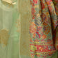 Rajwada Women Festive Green Silk Blend Woven Saree With Unstitched Blouse