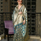 Rajwada Women Festive Teal Tissue Woven Saree With Unstitched Blouse