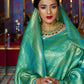Rajwada Teal Woven Design Silk Blend Saree With Unstitched Blouse For Women
