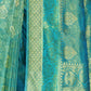 Rajwada Teal Woven Design Silk Blend Saree With Unstitched Blouse For Women