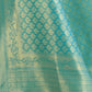 Rajwada Teal Silk Blend Woven Saree With Unstitched Blouse For Women