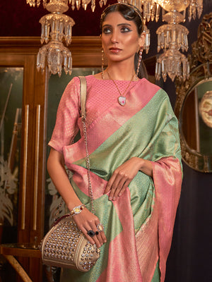 Rajwada Women Festive Green Silk Blend Woven Saree With Unstitched Blouse