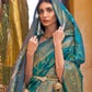 Rajwada Teal Woven Design Silk Blend Saree With Unstitched Blouse For Women