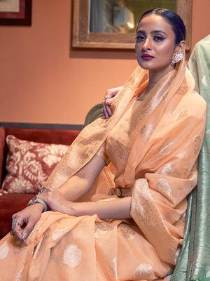 Rajwada Women Festive Orange Linen Blend Woven Saree With Unstitched Blouse