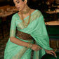 Rajwada Women Festive Green Silk Blend Woven Saree With Unstitched Blouse
