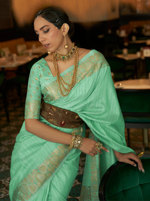 Rajwada Women Festive Green Silk Blend Woven Saree With Unstitched Blouse