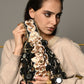 Rajwada Black And Gold Embroidered Potli Bag with Tassels For Women