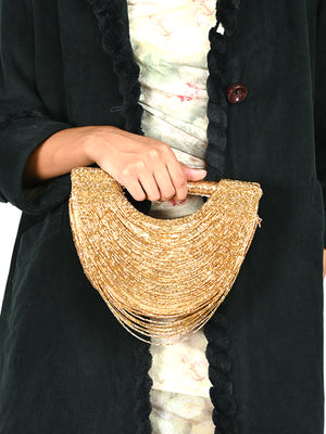 Rajwada Gold Tasseled Moon Clutch For Women