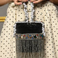 Rajwada Black Embellished Cylindrical Clutch With Tassels For Women
