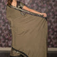 Rajwada Olive Green Embellished Crepe Saree With Stitched Blouse For Women