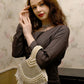 Rajwada Women All Pearls Tasselled White Clutch