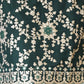 Rajwada Women Green Faux Georgette Embroidered Semi Stitched Palazzo Suit