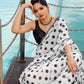 White Georgette Polka Dots Saree With Unstitched Blouse