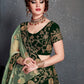 Rajwada Dark Green Velvet Embroidered Semi Stitched Lehenga With Blouse For Women