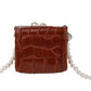 Brown crocodile textured double pearl belt bag - Rajwada