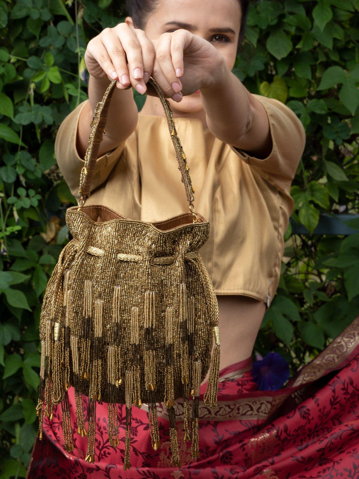 Deep Gold Studded Tassel Potli Bag - Odette