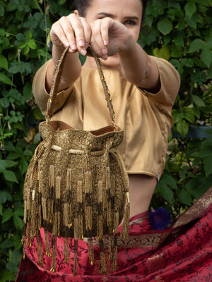 Deep Gold Studded Tassel Potli Bag - Odette