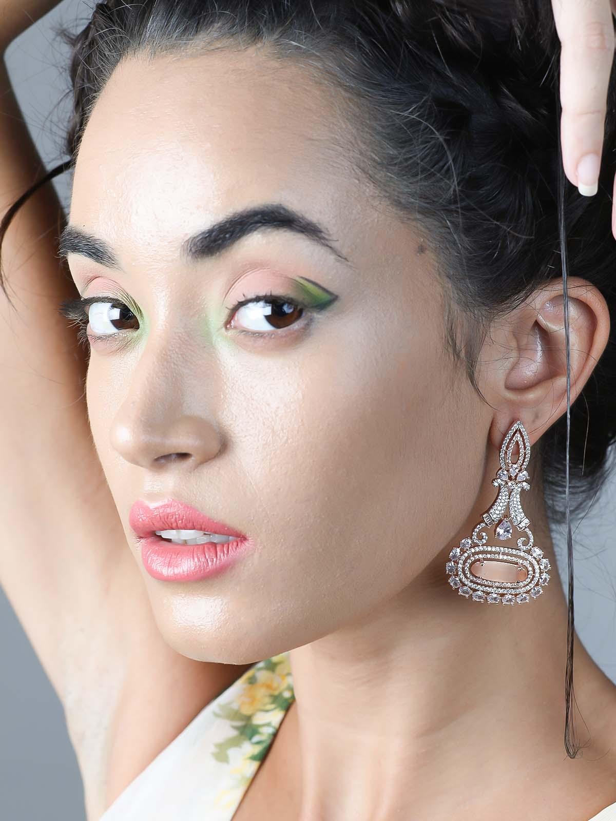 Elegant stunning peach dangle earrings - Rajwada