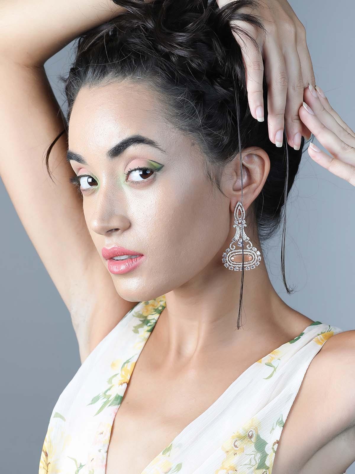 Elegant stunning peach dangle earrings - Rajwada