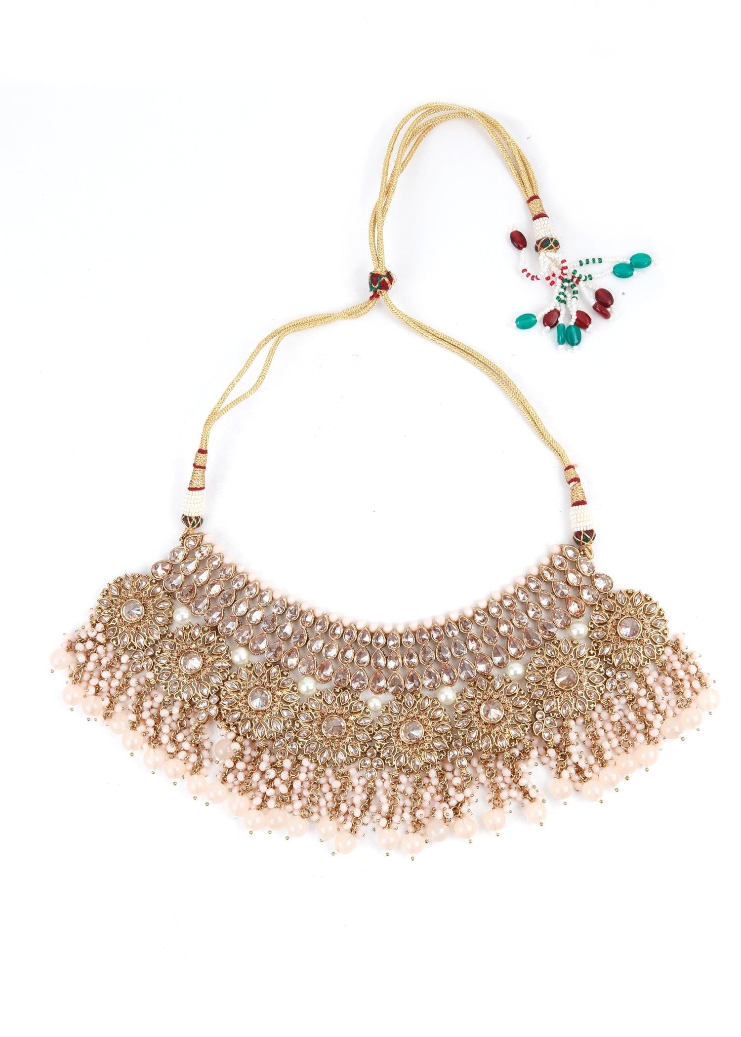 Exquisite 3 Piece Set of Necklace, Earrings and Maang Tikka - Rajwada