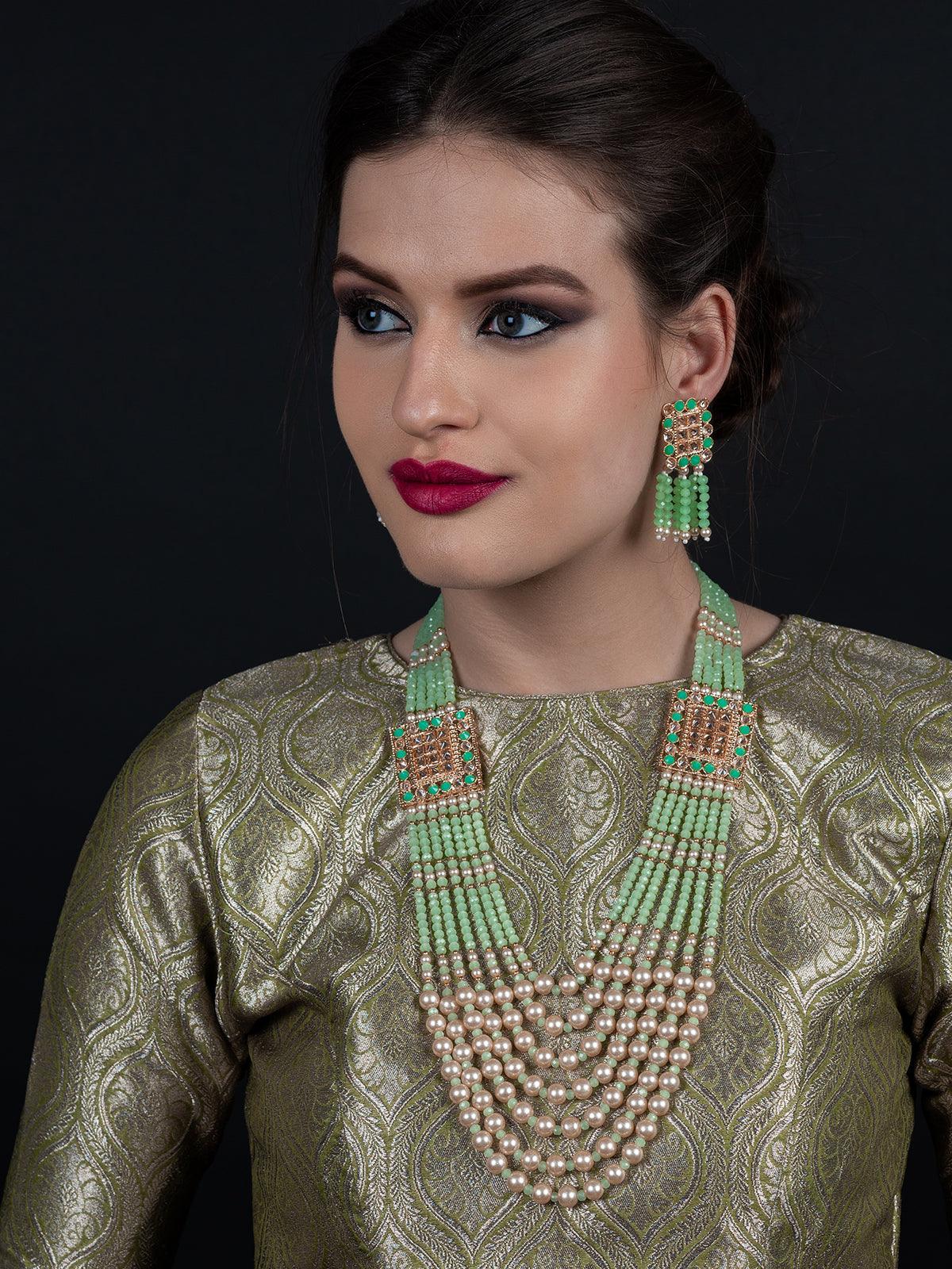 Flaunting green beads and pearl necklace - Rajwada