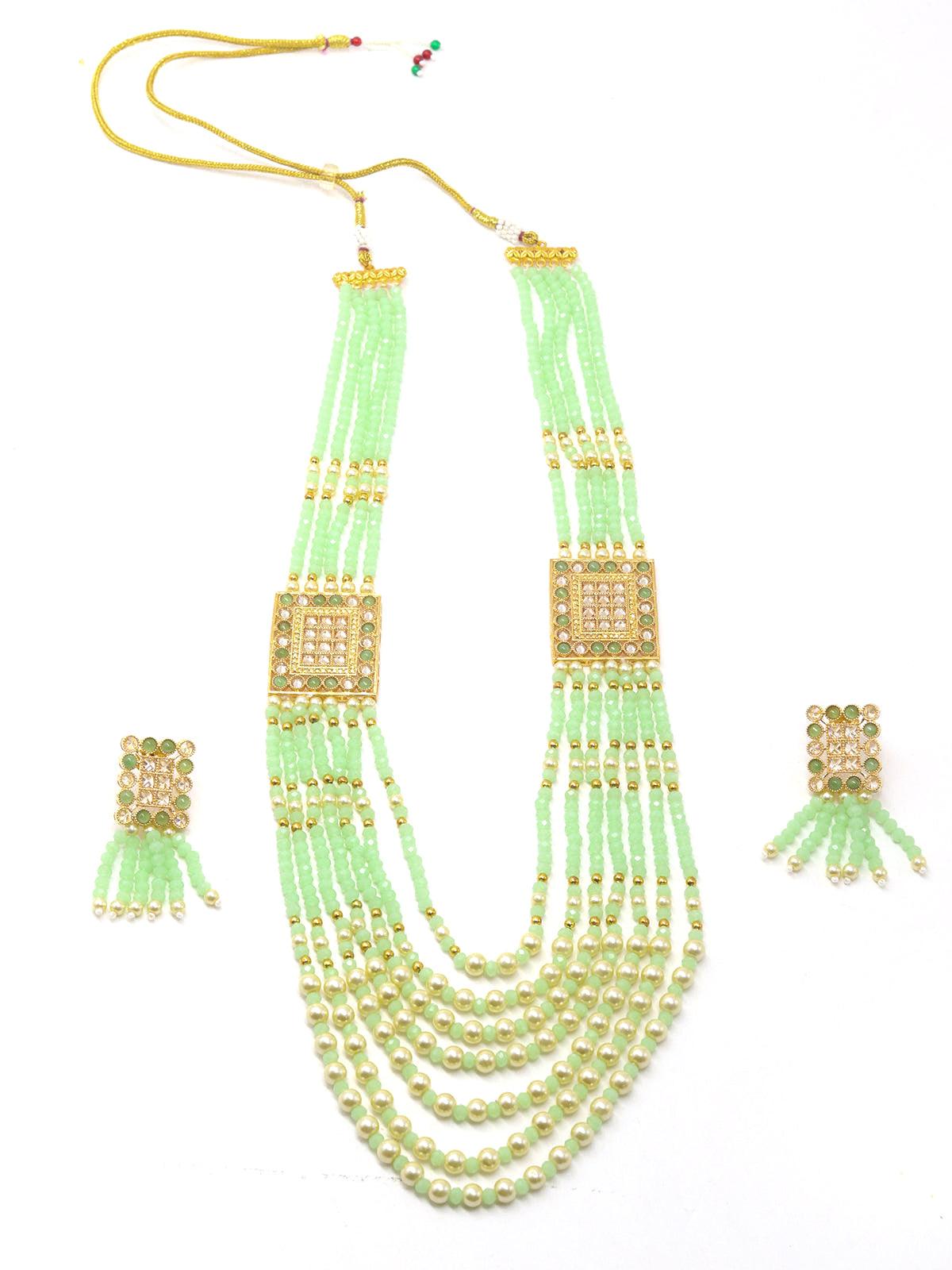 Flaunting green beads and pearl necklace - Rajwada