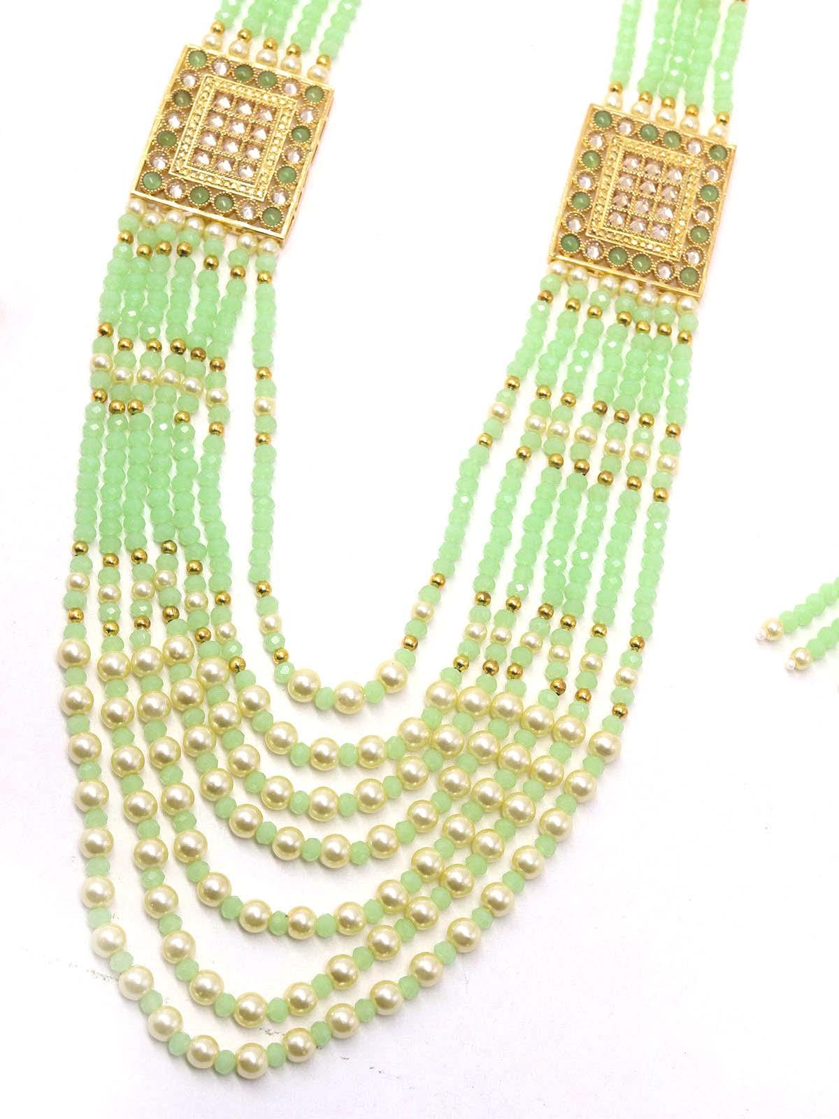 Flaunting green beads and pearl necklace - Rajwada