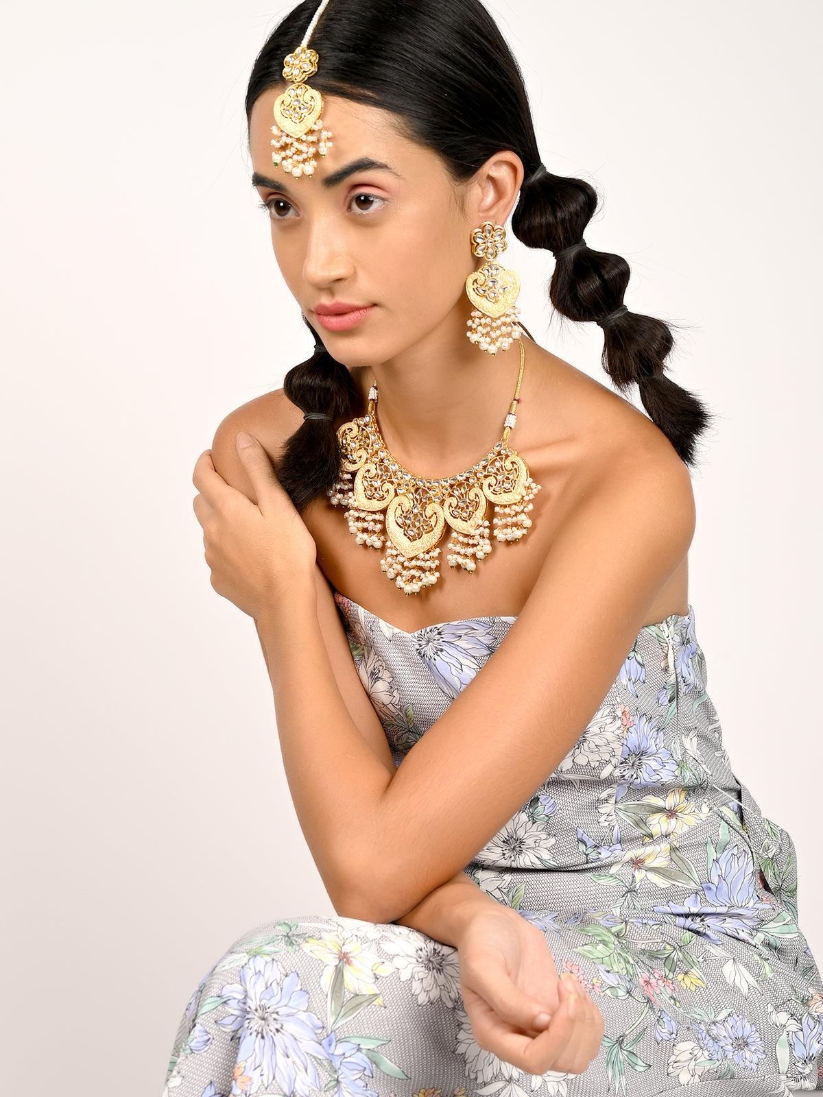 Gorgeous gold embellished necklace set for women - Rajwada