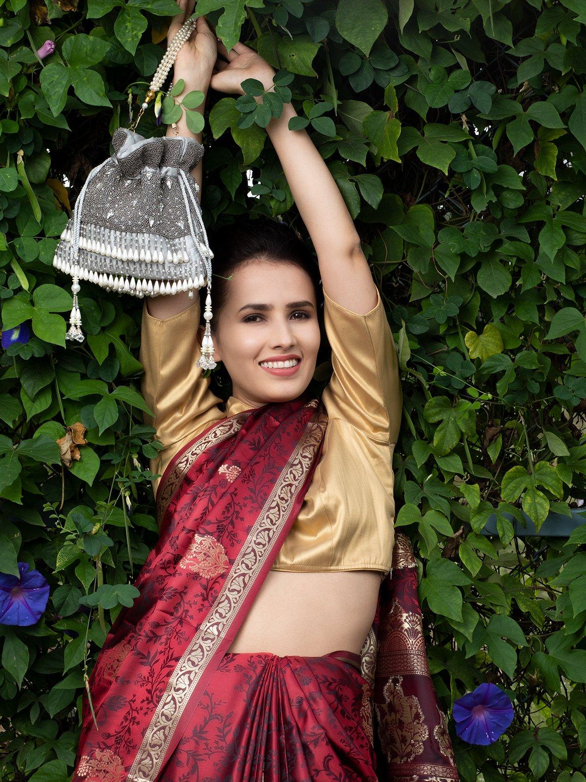 Grey Heavily Embroidered Tassel Potli Bag - Rajwada