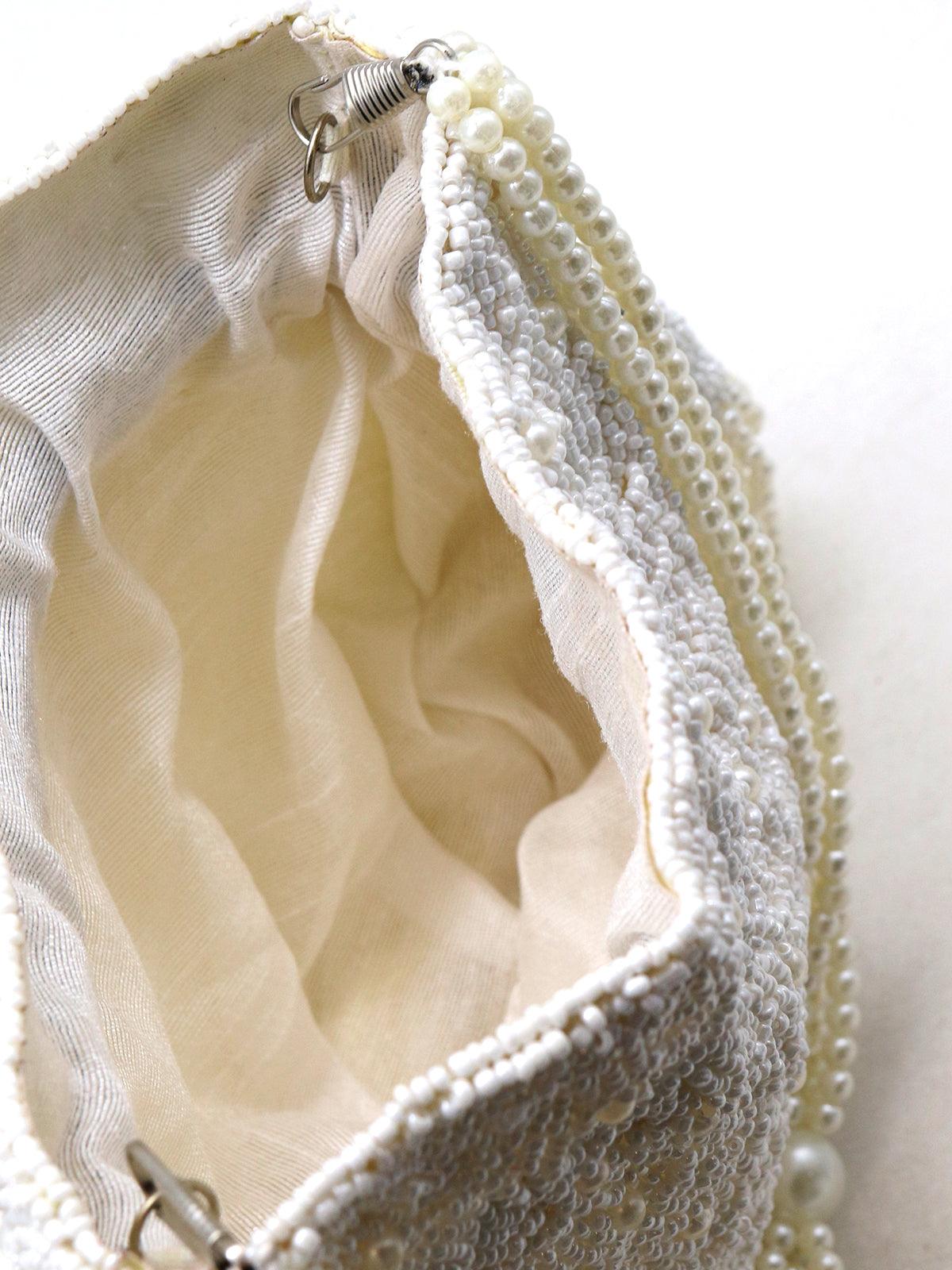 Heavily adorned pearl potli handbag! - Rajwada