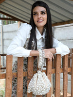 IMPRESSIVE CREAM EMBELLISHED POTLI BAG - Odette