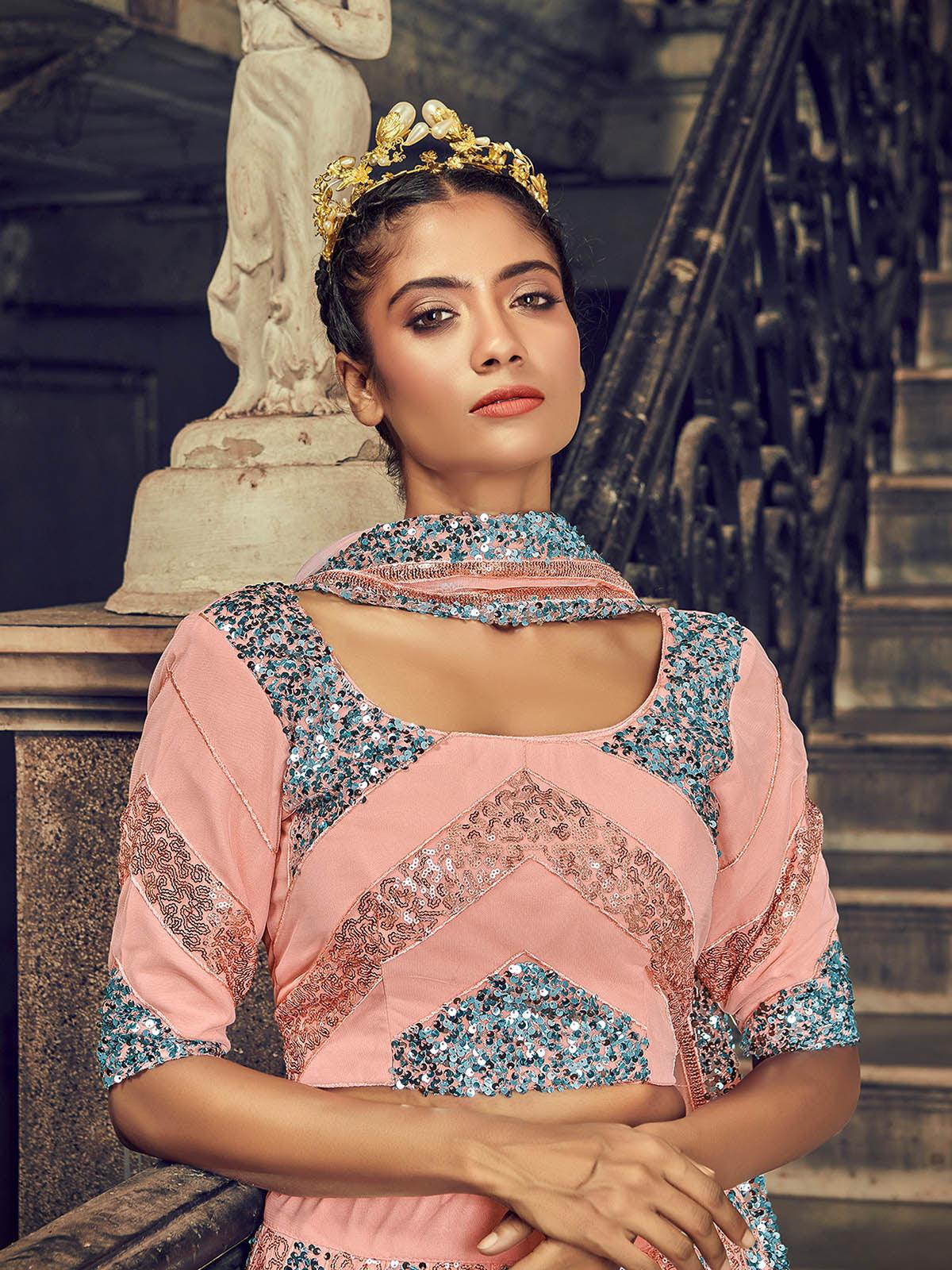 Impressive Peach Net Sequins Lehenga Set - Rajwada