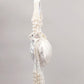 IMPRESSIVE WHITE EMBELLISHED POTLI BAG - Rajwada