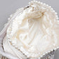 IMPRESSIVE WHITE EMBELLISHED POTLI BAG - Rajwada