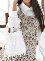IMPRESSIVE WHITE EMBELLISHED POTLI - Odette