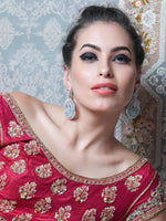 LUXURIANT GERMAN RHODIUM AND BLUE DANGLING EARRINGS - Rajwada