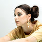 Matted Golden Chiselled Dangle Earrings - Rajwada