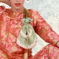 Parrot-green potli with pearls - Rajwada