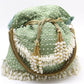 Parrot-green potli with pearls - Rajwada